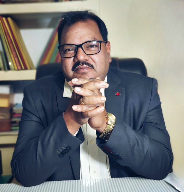 Portrait of Radhey Shyam Sharma, Founder and Director of NVEW